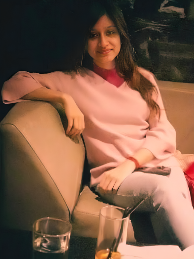 Founder sitting on the sofa.